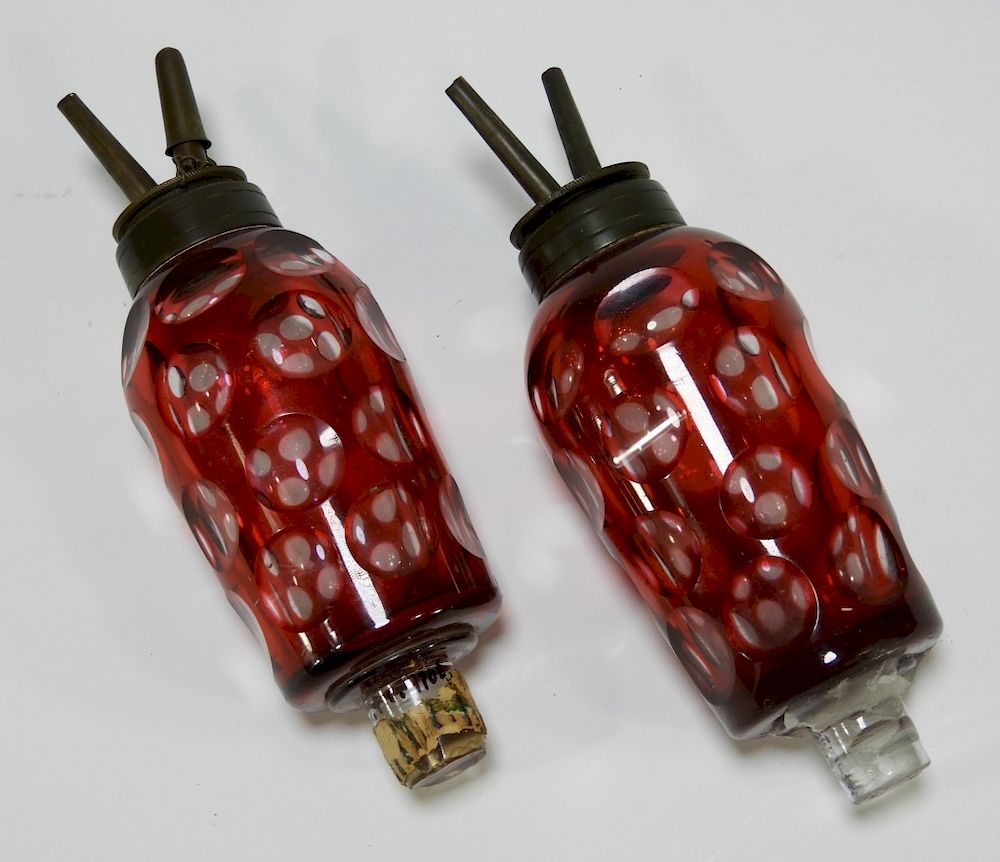 Appraisal: PR C American Cranberry Cut Glass Peg Lamps United States