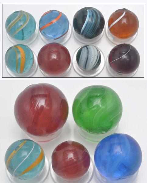 Appraisal: Lot of Colored Glass Transparent Swirls Description Lot includes mainly