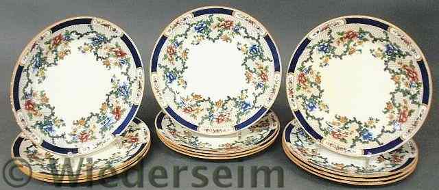 Appraisal: Set of twelve English service plates with blue and floral