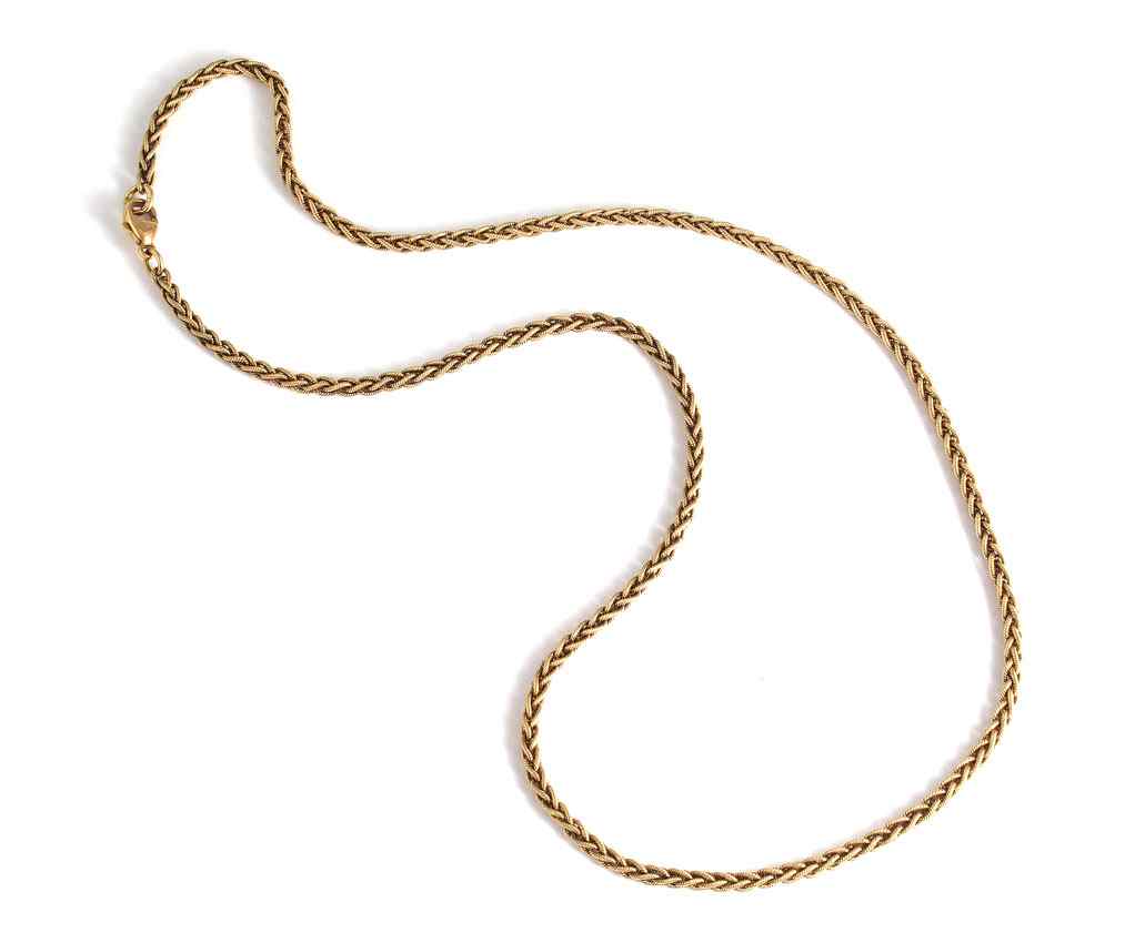 Appraisal: K BRAIDED GOLD NECKLACE K yellow gold necklace Braided wire