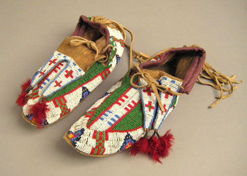 Appraisal: Central Plains beaded hide moccasins Lakota last quarter th c