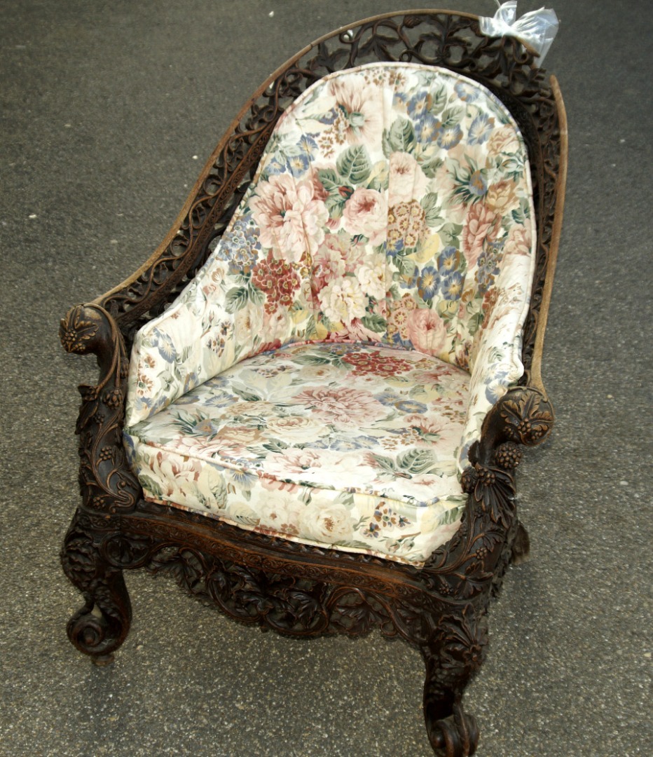 Appraisal: An Anglo Indian carved hardwood bergere chair with acorn and