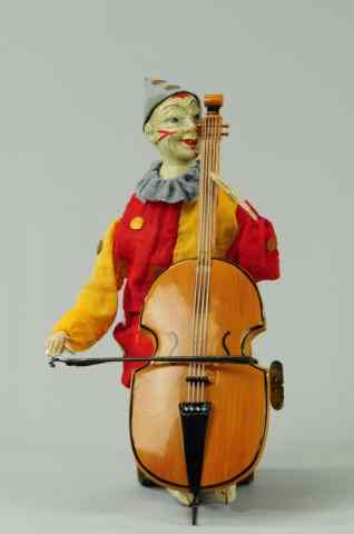 Appraisal: CLOWN PLAYING BASS Germany attributed to Staudt clown wears cloth