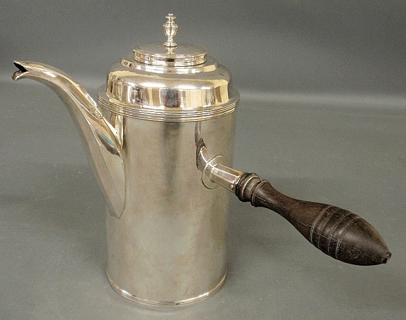 Appraisal: - Silver chocolate pot with a turned wood handle base