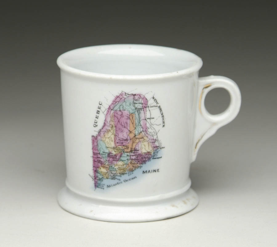 Appraisal: MAINE SHAVING MUG White ceramic mug features a map of