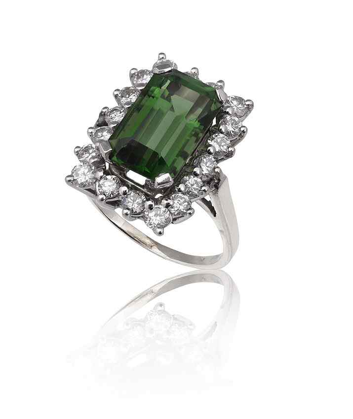 Appraisal: EMERALD CUT TOURMALINE DIAMOND RING K white gold ring centers