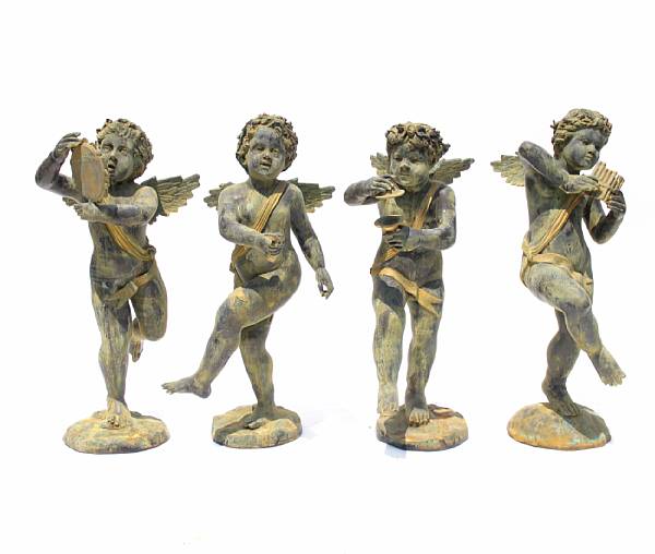 Appraisal: A set of four bronze cherub musicians largest measures height