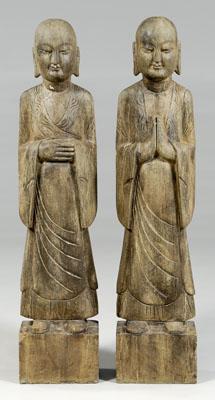 Appraisal: Pair Chinese stone lohans carved figures standing on rectangular bases