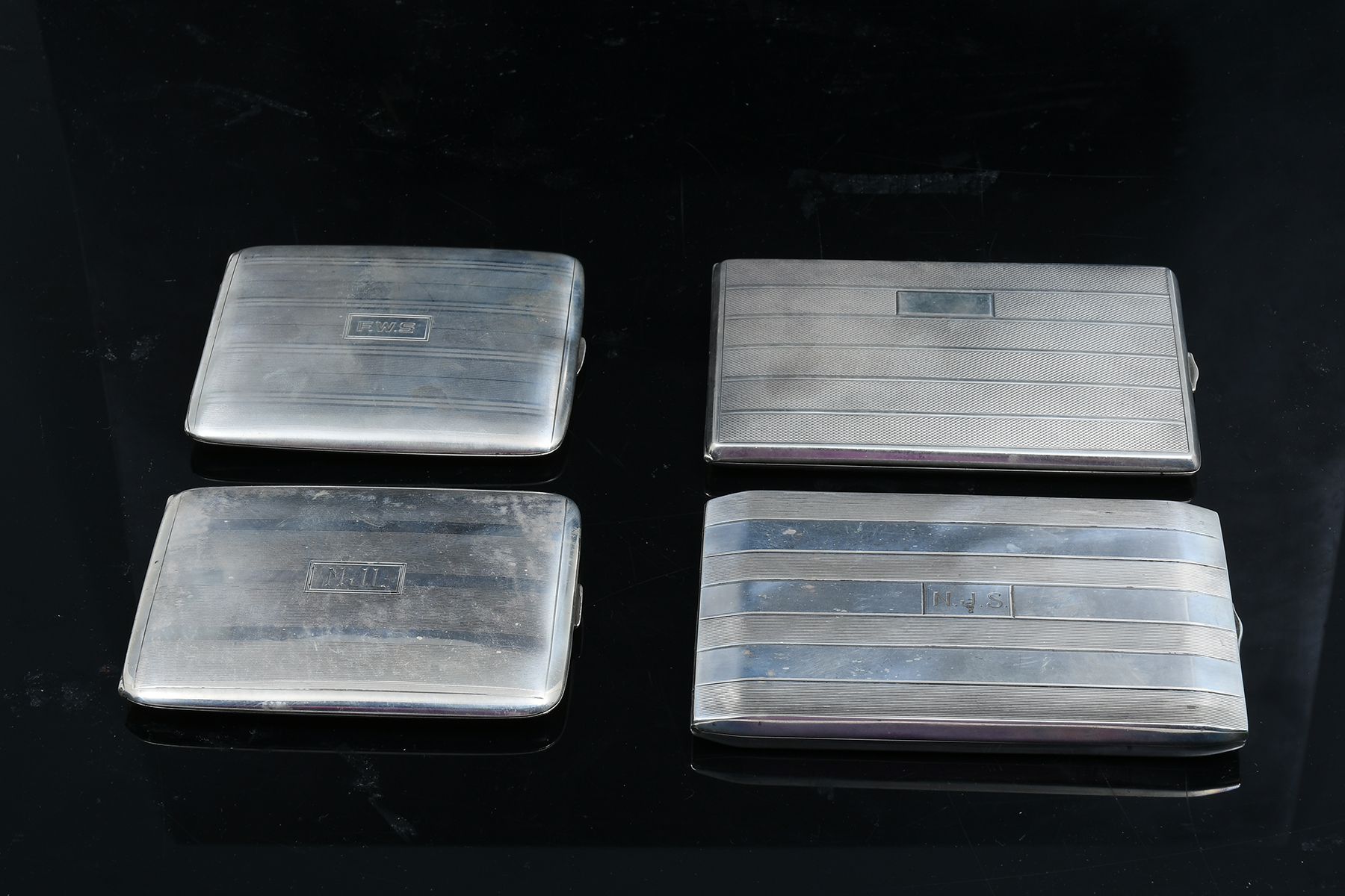 Appraisal: ENAMELED SILVER ART DECO CIGARETTE CASES Comprising - German case