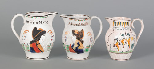 Appraisal: Two similar Prattware type pitchers late th c with portraits