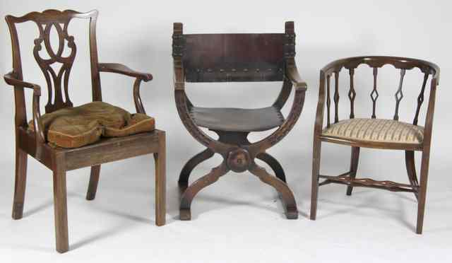 Appraisal: A George III style fruitwood armchair with rush seat and