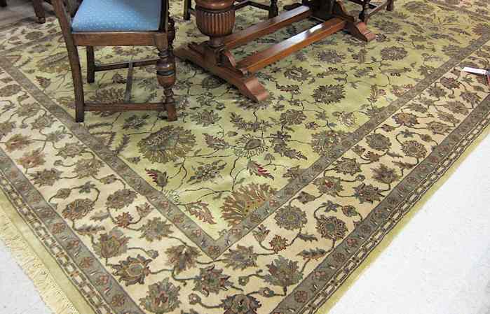 Appraisal: HAND KNOTTED ORIENTAL CARPET Pakistani Persian overall foliate design on