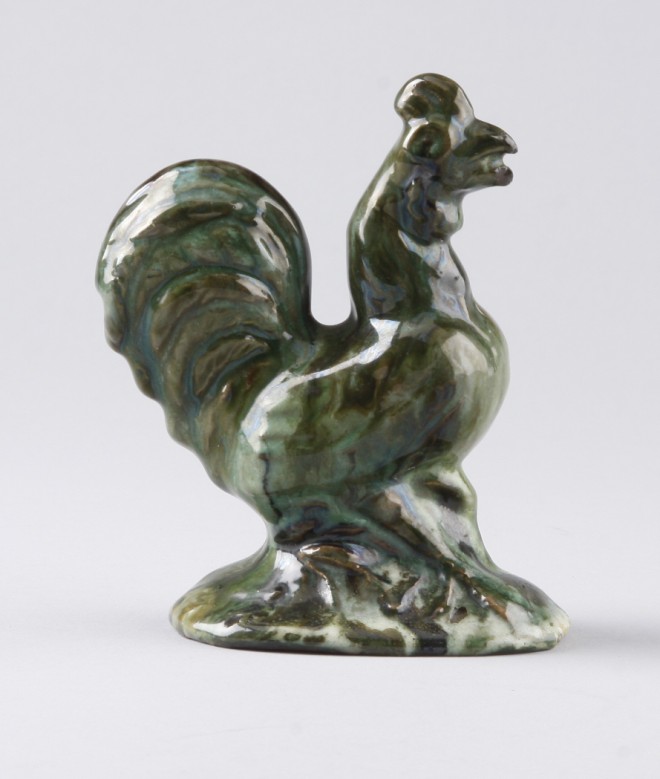 Appraisal: Redware rooster features green glaze marked on base Made by