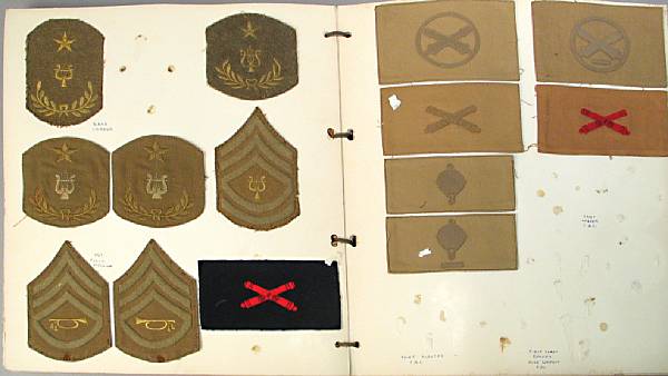 Appraisal: An album of shoulder sleeve insignia A large format album