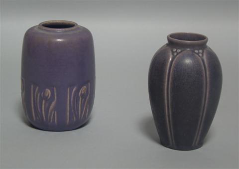 Appraisal: TWO ROOKWOOD MATTE PURPLE VASES The first impressed date cylindrical