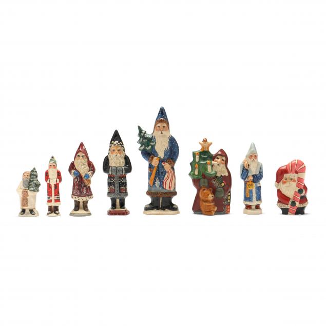 Appraisal: SELECTION OF EIGHT SMALL VAILLANCOURT SANTA FIGURES All signed numbered