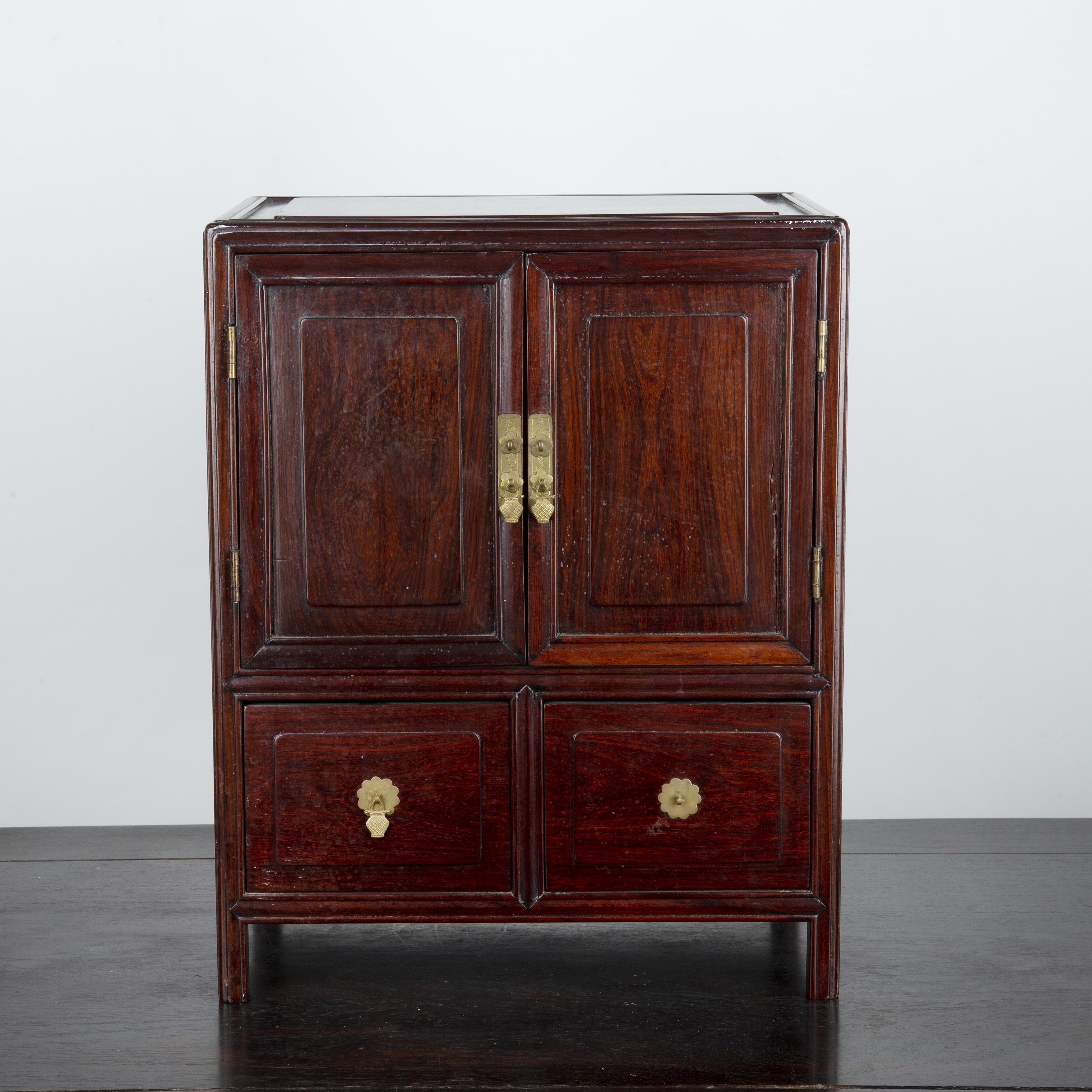 Appraisal: Table top rosewood cabinet Chinese with cupboard doors enclosing small