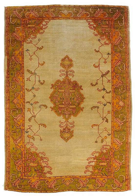 Appraisal: Oushak Carpet floral central medallion on tan field leaf and