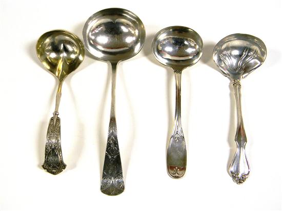 Appraisal: Four sterling and coin ladles '' l ladle with monogrammed