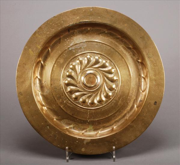 Appraisal: A Nuremberg brass alms dish late th century the centre