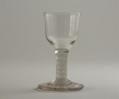 Appraisal: A small firing glass with plain bowl and multiple opaque