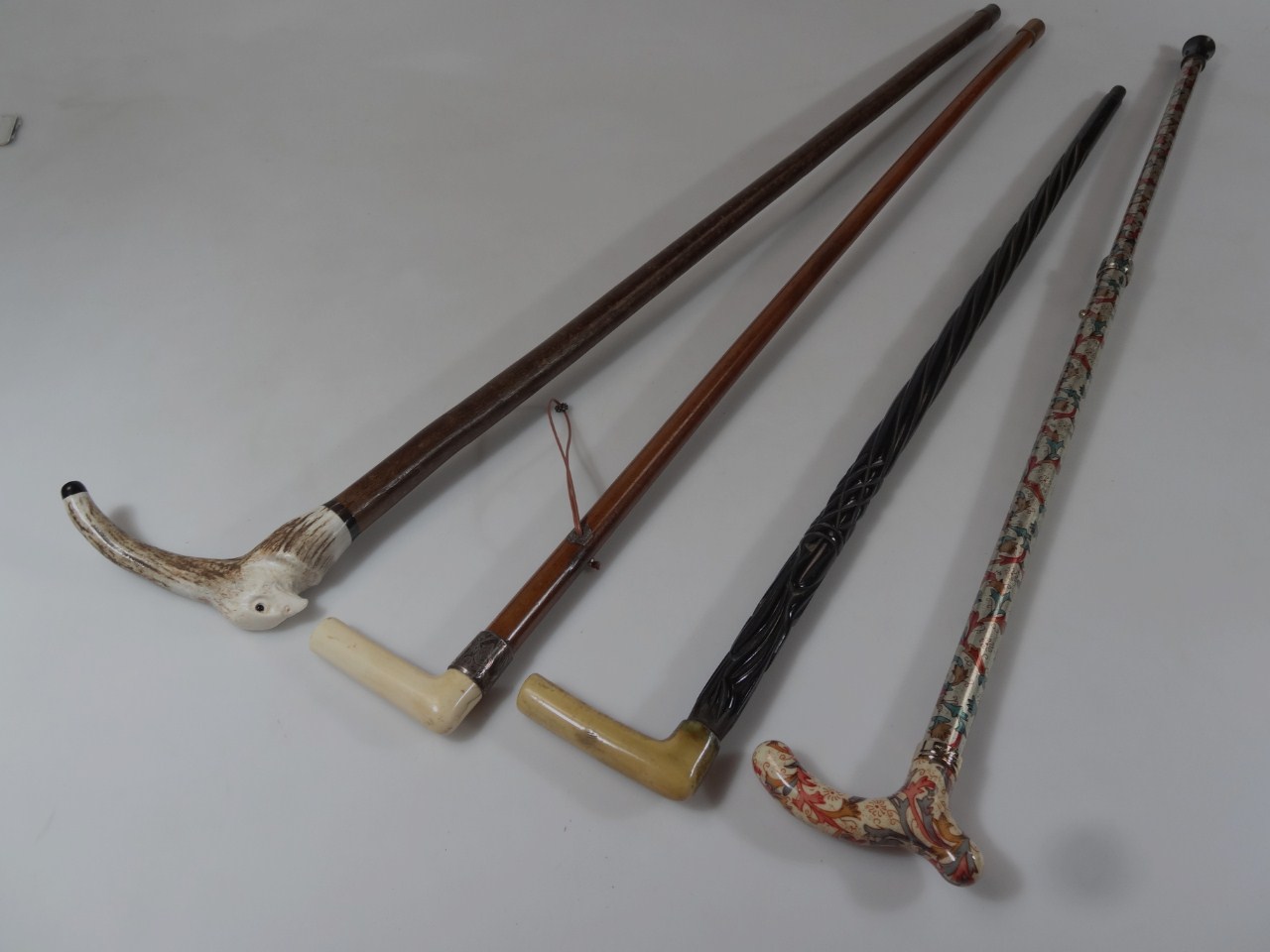 Appraisal: Various walking sticks to include on with an eagle head