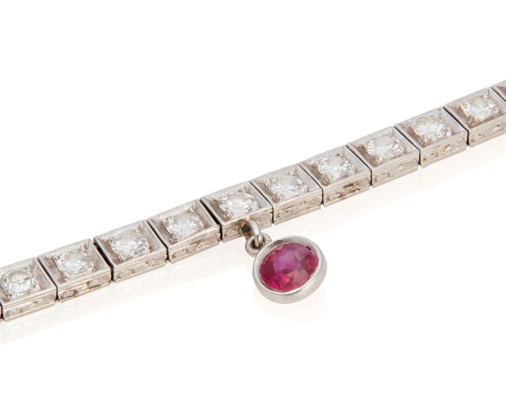 Appraisal: A DIAMOND AND RUBY BRACELETA diamond and ruby bracelet Platinum