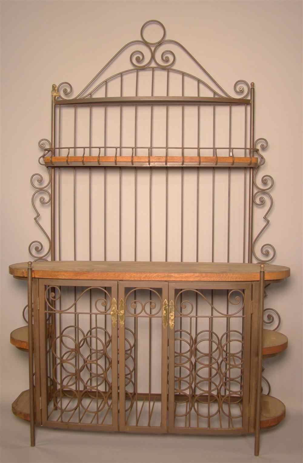 Appraisal: BAKER'S OAK AND METAL RACK With scroll cast cresting over