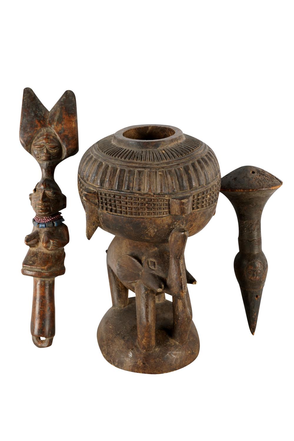 Appraisal: THREE AFRICAN WOOD CARVINGSProvenance The Estate of Dr Leon and