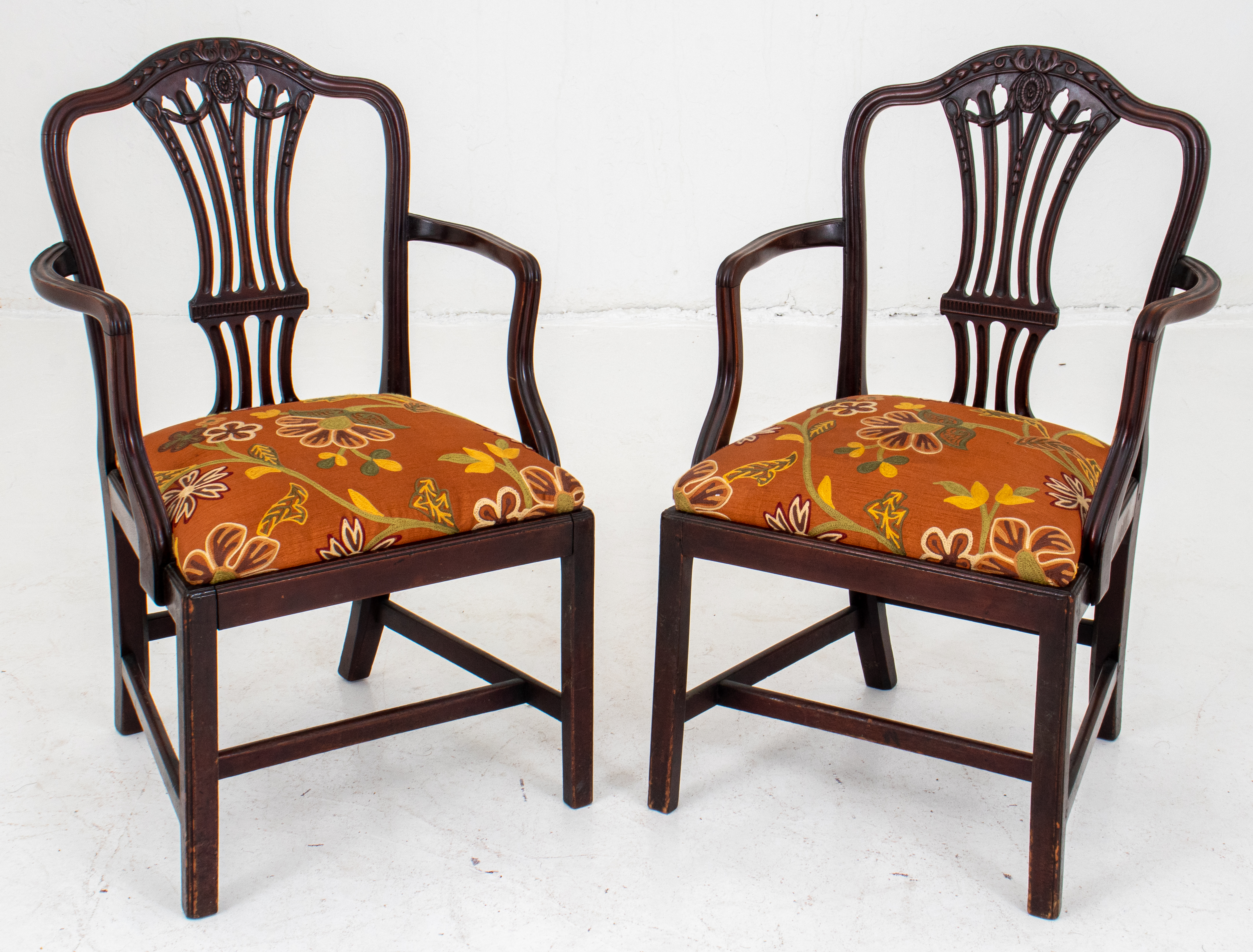 Appraisal: GEORGE III MAHOGANY ARMCHAIRS PR TH C George III mahogany