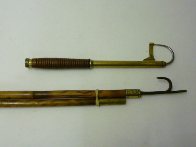 Appraisal: A BRASS TELESCOPIC GAFF early th century with steel spike