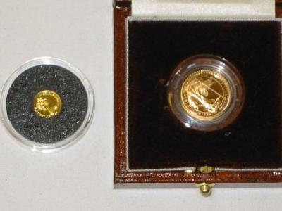 Appraisal: A BRITANNIA OUNCE PROOF GOLD COIN and a Gibraltar One