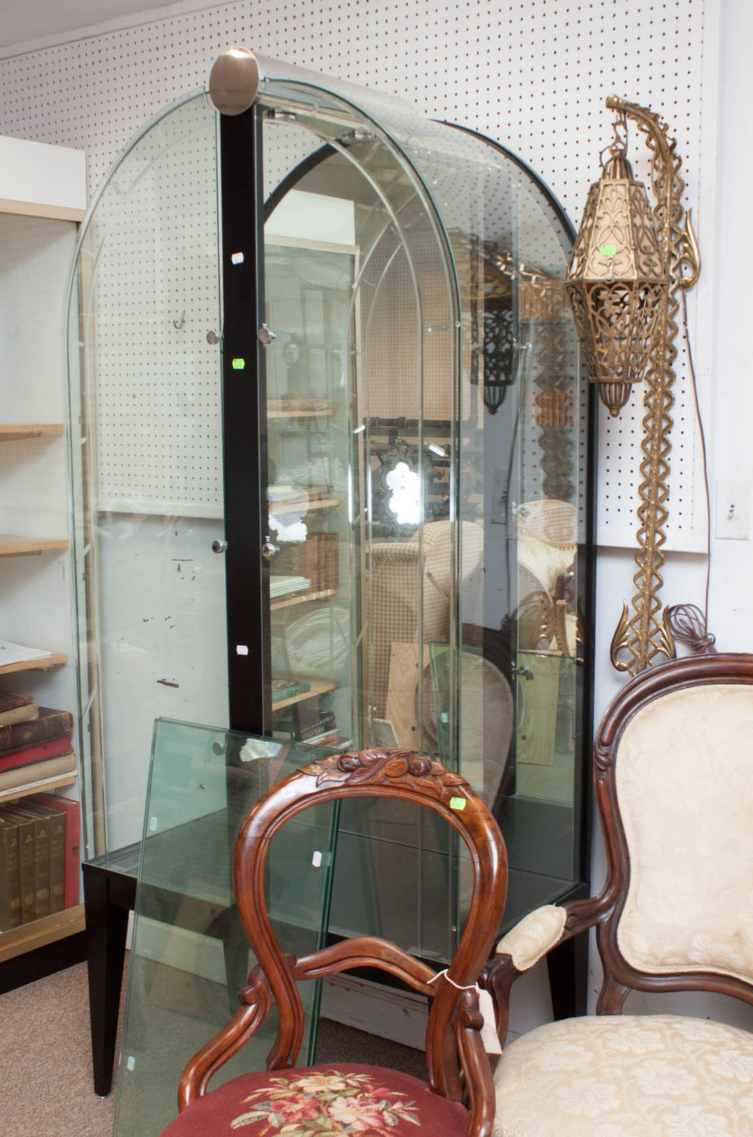 Appraisal: Glass and wood contemporary display cabinet with hanging wall lamp