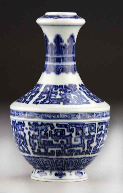 Appraisal: Chinese Blue and White Porcelain VaseOf archaic form painted with