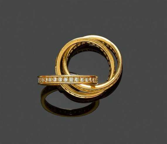 Appraisal: DIAMOND RING CARTIER Yellow gold Casual-elegant Trinity model of three