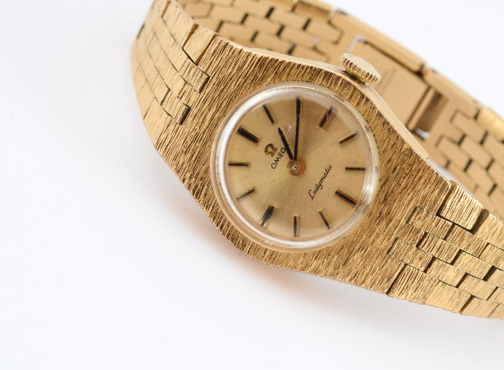 Appraisal: OMEGA LADYMATIC WRISTWATCH Gold filled watch and integrated bracelet Round