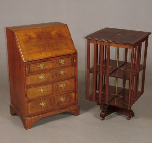 Appraisal: An Edwardian mahogany and inlaid revolving bookcase the square top