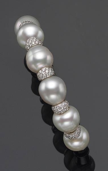 Appraisal: A baroque South Sea cultured pearl diamond and eighteen karat