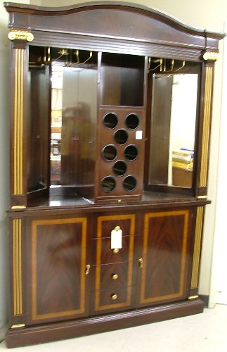 Appraisal: NEOCLASSICAL STYLE PARCEL-GILT MAHOGANY BACK BAR Empire Craftsman Furniture Co