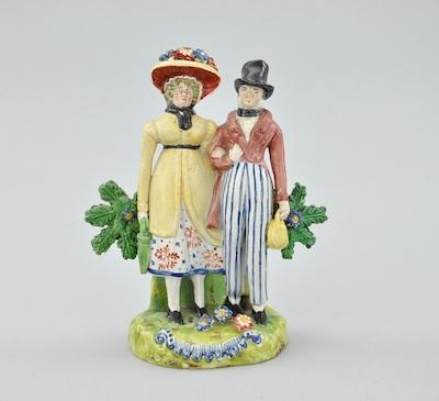 Appraisal: An Early Staffordshire Figural of Dandies With bocage background standing