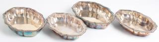 Appraisal: Silver Oval form with gadrooned scalloped rim two larger marked