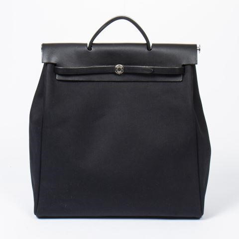 Appraisal: Hermes Herbag GM in black canvas having black leather handle