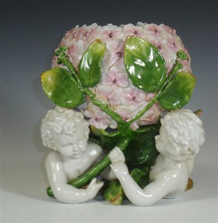 Appraisal: A German style floral cache pot the pot decorated with