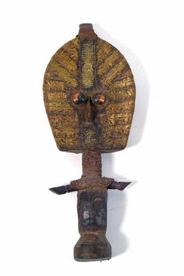 Appraisal: A Kota style reliquary figure with metal sheet applied decoration