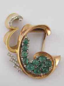 Appraisal: An Art Deco yellow metal tests carat gold emerald and