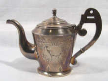 Appraisal: Russian Interest A Russian silver tea pot with engraved decoration