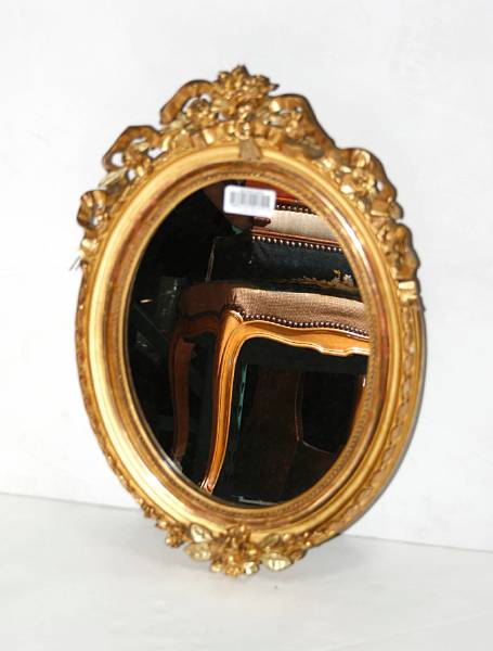 Appraisal: A Louis XVI style molded gilt gesso mirror late th