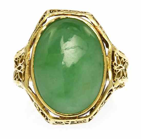 Appraisal: An Karat Yellow Gold and Jade Ring containing one oval