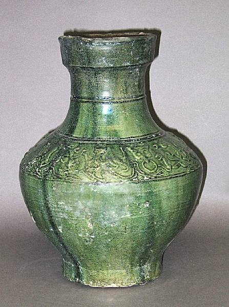 Appraisal: A green glazed pottery jar Han Dynasty Of hu form