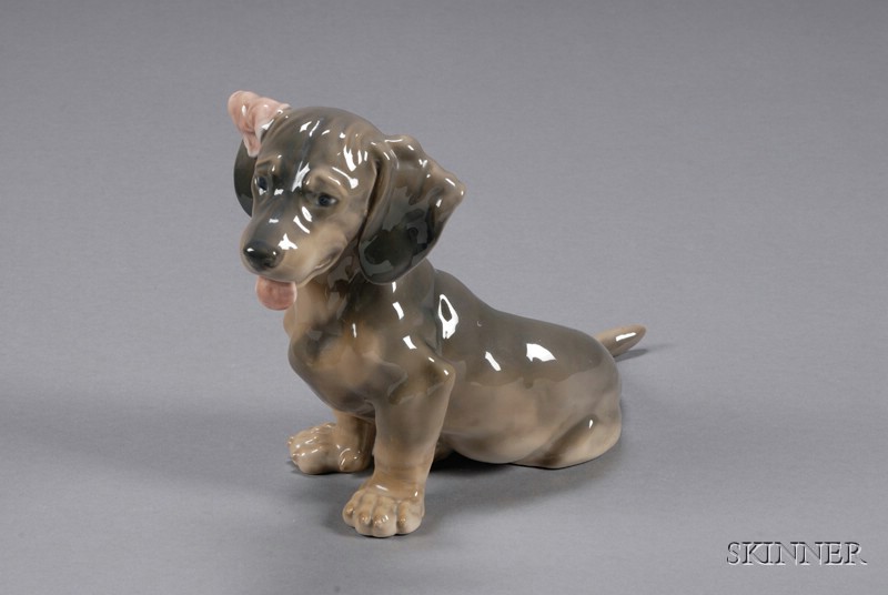 Appraisal: Royal Copenhagen Porcelain Model of a Dachshund Denmark number inscribed